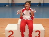 Judith con 4 trofeos
